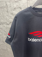 Balenciaga short-sleeve T-shirt in dark navy with red logo and partial “balenciaga”