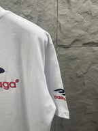 White Balenciaga T-shirt sleeve with red logo detail near cuff