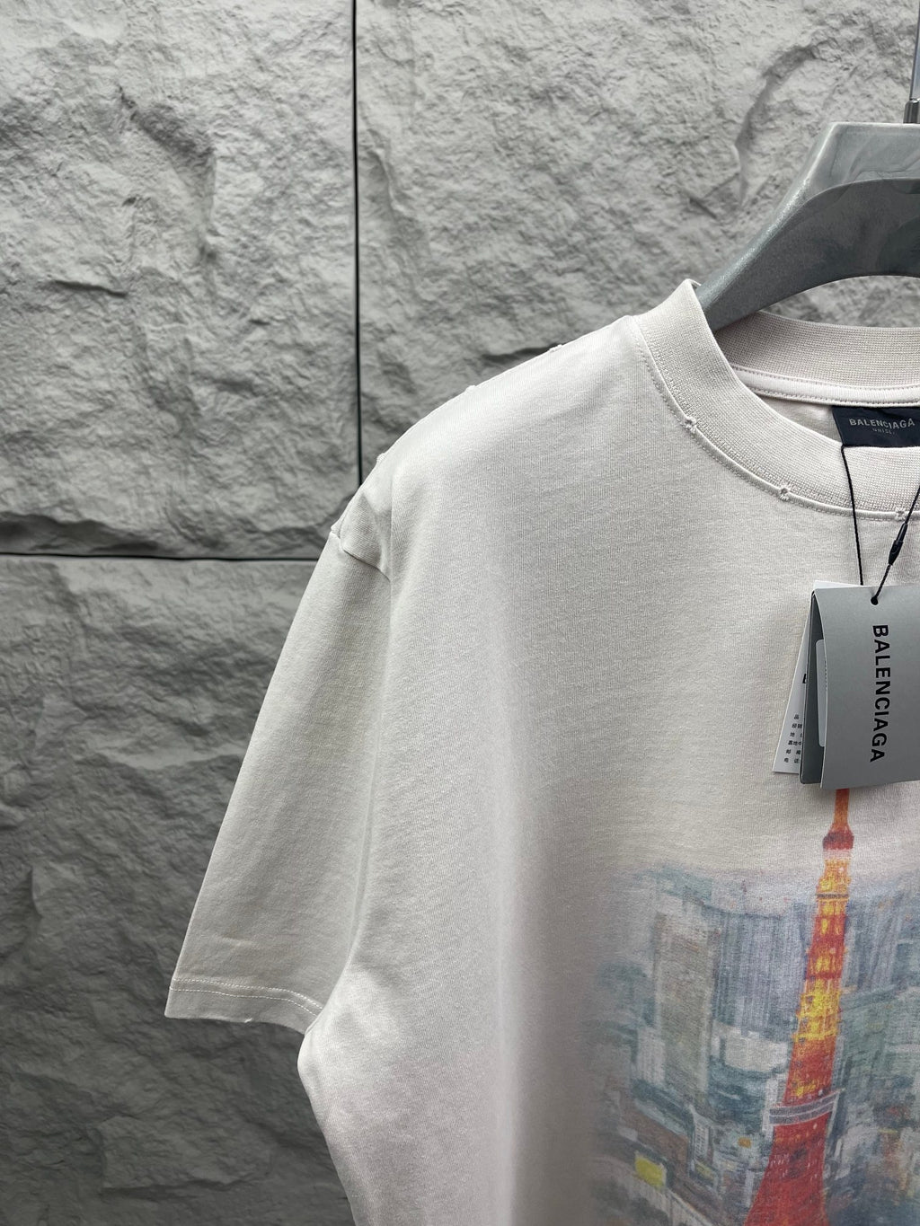 White short-sleeve T-shirt with Eiffel Tower print and Balenciaga hang tag