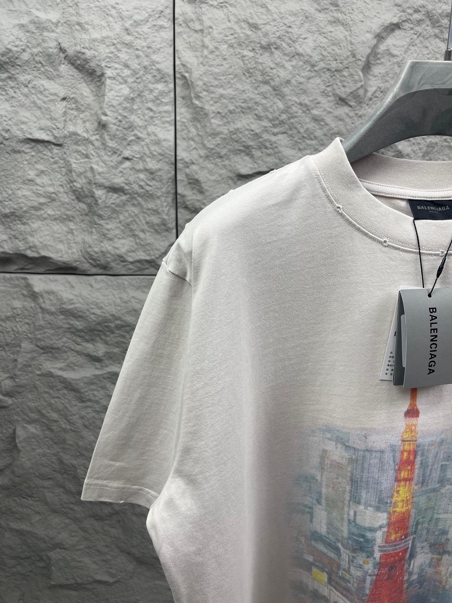 White short-sleeve T-shirt with Eiffel Tower print and Balenciaga hang tag