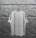 White short-sleeve T-shirt back view with red scripted logo along the hem