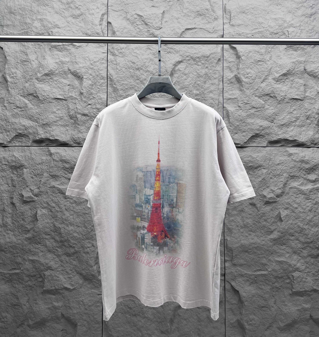 White short-sleeve T-shirt with red Eiffel Tower graphic and scripted logo