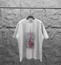 White short-sleeve T-shirt with red Eiffel Tower graphic and scripted logo
