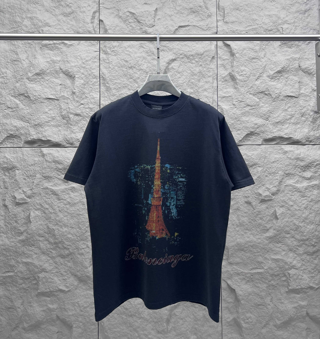 Navy short-sleeve T-shirt with Eiffel Tower graphic on the front and cursive logo text