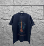 Navy short-sleeve T-shirt with Eiffel Tower graphic on the front and cursive logo text