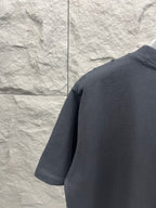 Dark gray T-shirt back view with crew neck and relaxed short-sleeve cut