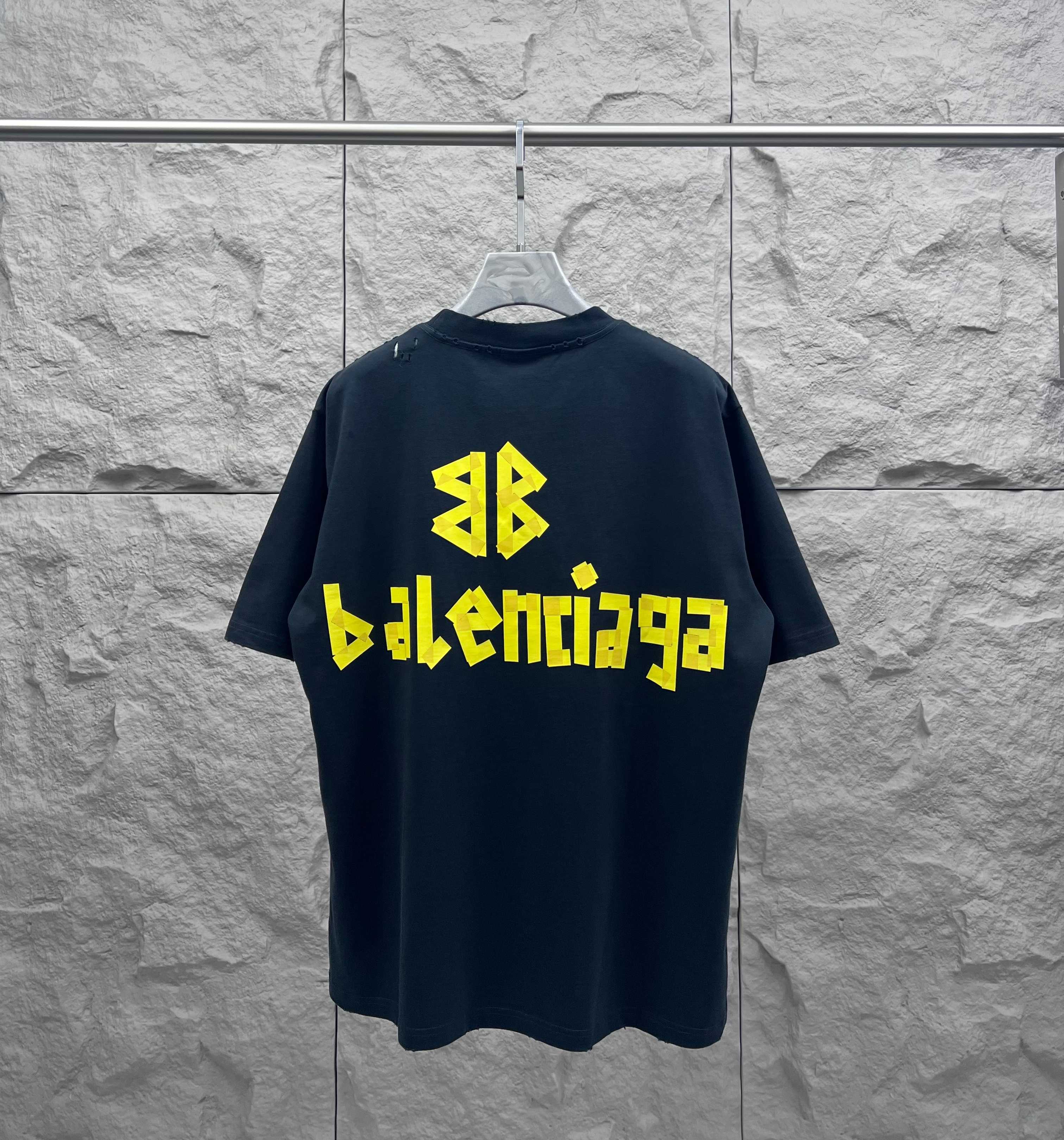 Navy Balenciaga logo T-shirt with yellow back graphic and emblem
