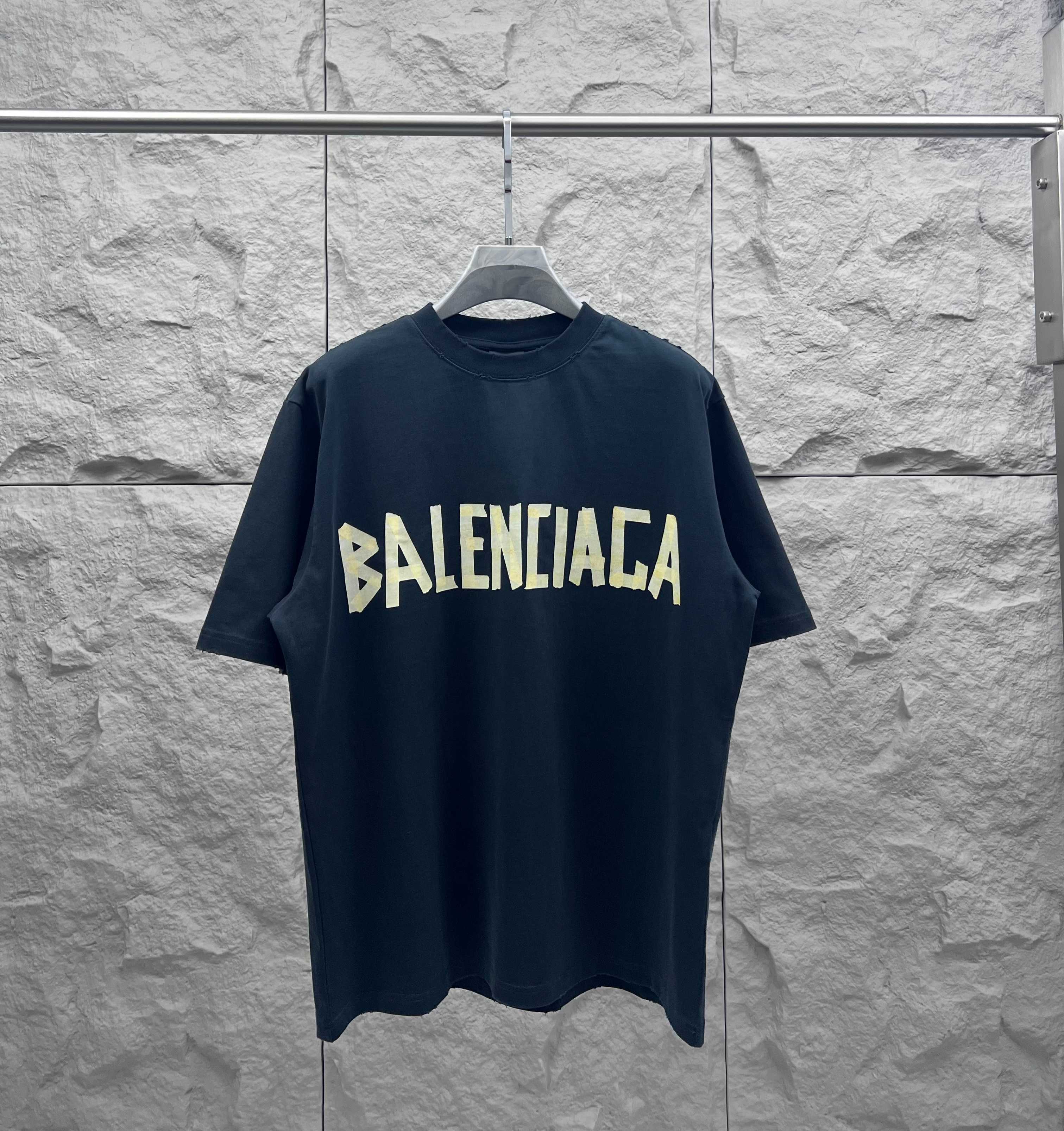 Navy Balenciaga logo T-shirt with large yellow front graphic
