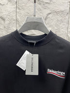 Balenciaga crewneck T-shirt in dark fabric with embroidered chest logo and hang tag