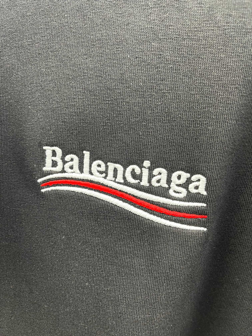 Balenciaga logo print on dark T-shirt with red and white stripes