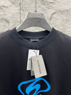 Balenciaga short-sleeve T-shirt neckline with hang tags and blue logo graphic