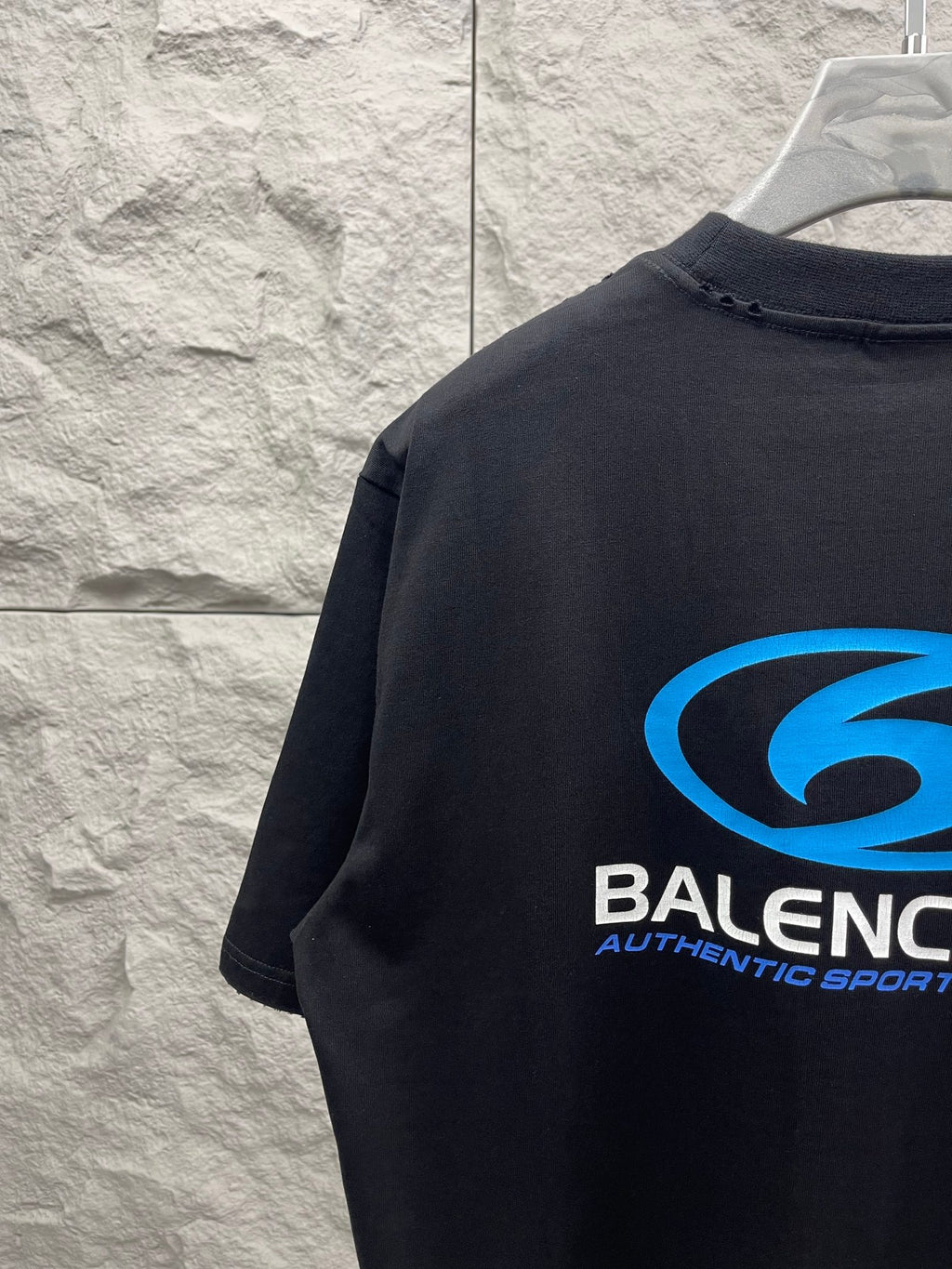 Balenciaga short-sleeve T-shirt back with partial blue logo print near neckline