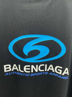 Balenciaga short-sleeve T-shirt close-up of blue logo and brand text