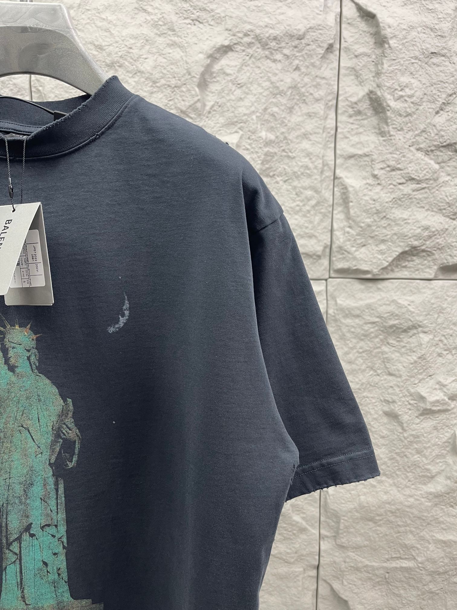 Balenciaga dark navy T-shirt sleeve with Statue of Liberty print detail