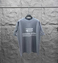 Grey crewneck T-shirt with large front logo graphic and short sleeves.
