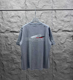Grey crewneck T-shirt with large back logo print.