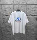 White short-sleeve T-shirt with blue Balenciaga chest logo graphic