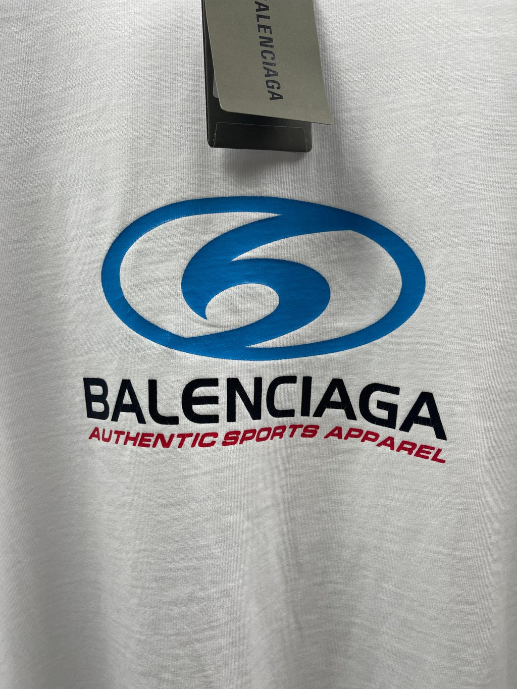 White short-sleeve T-shirt with large blue Balenciaga logo graphic