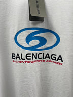 White short-sleeve T-shirt with large blue Balenciaga logo graphic