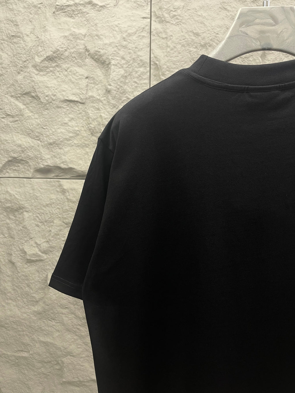 Balenciaga dark T-shirt back side view with short sleeves and crew neck