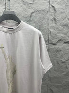 Balenciaga white T-shirt side view with Statue of Liberty graphic on front