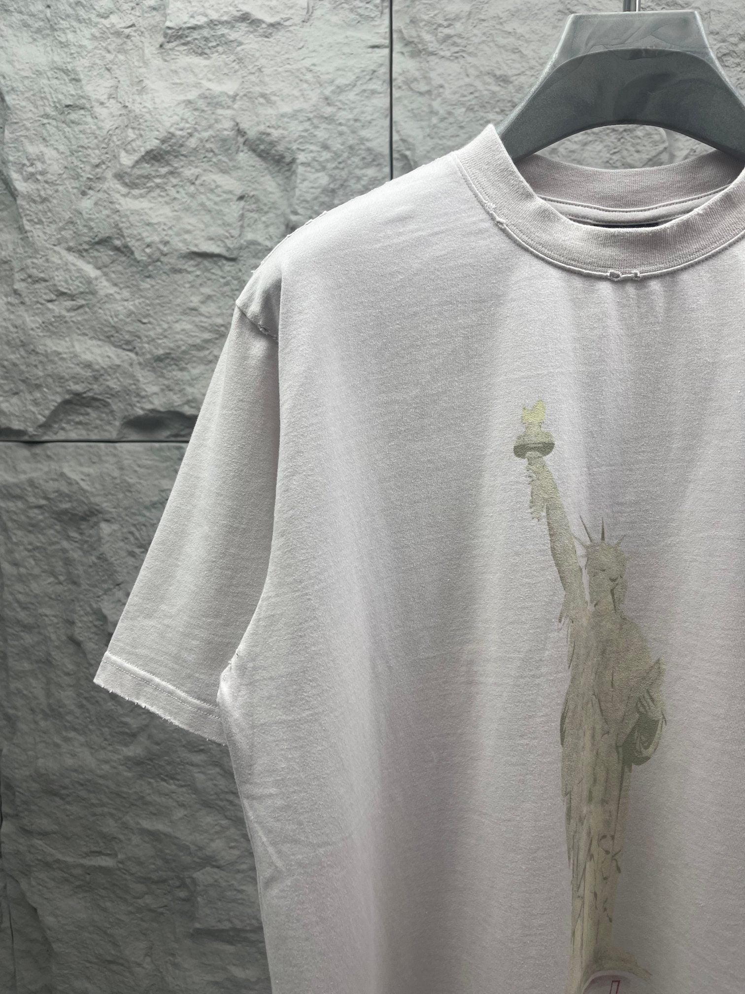 Balenciaga white T-shirt front close-up of Statue of Liberty print