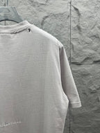 Balenciaga white T-shirt back view with collar detail and partial logo