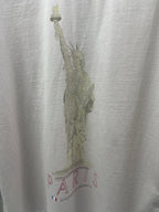 Balenciaga white T-shirt close-up of Statue of Liberty graphic and Paris text