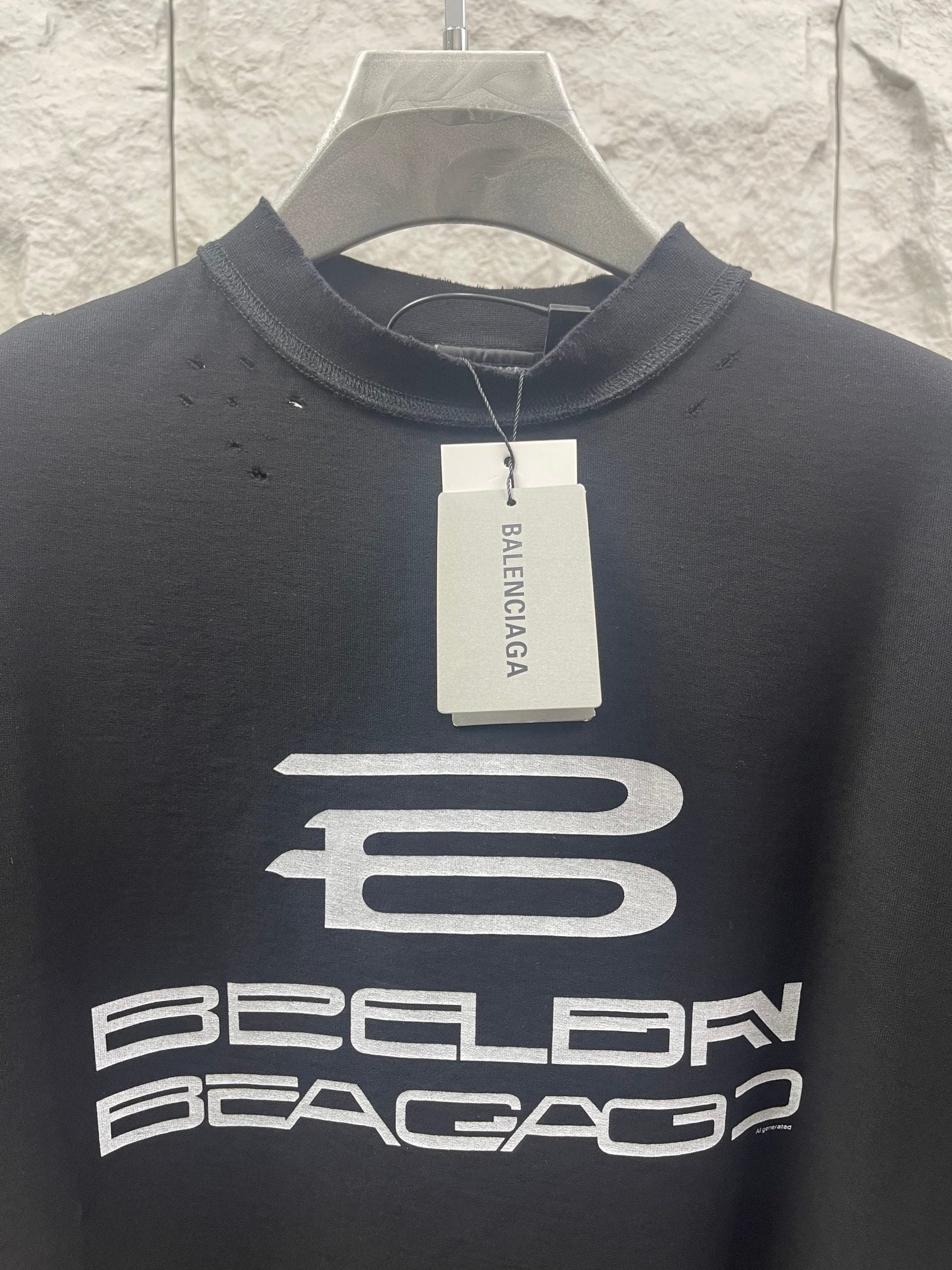 Balenciaga dark short-sleeve T-shirt with neckline tag and large chest logo