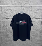 Balenciaga dark short-sleeve T-shirt with centered graphic logo on chest