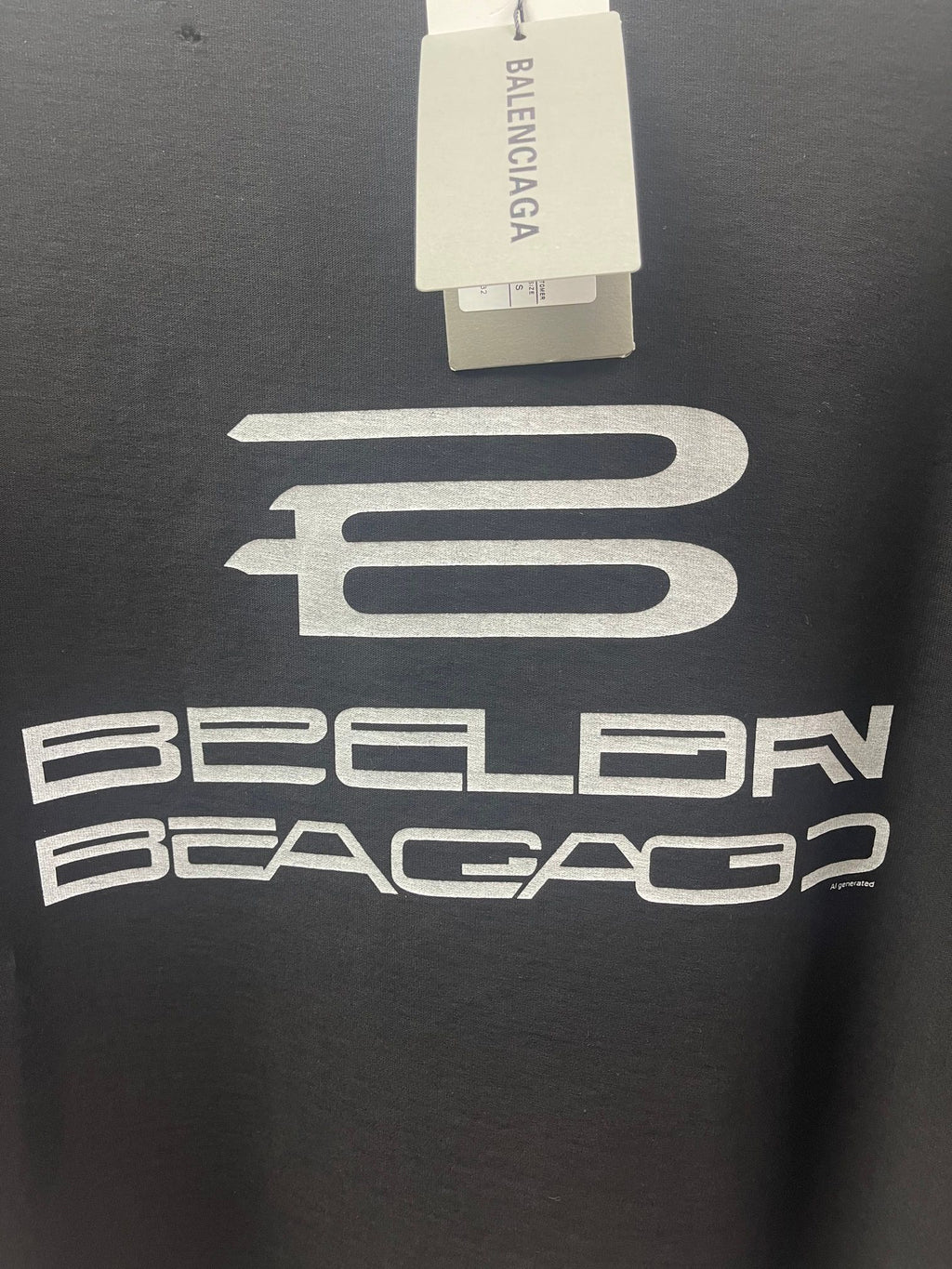 Balenciaga dark short-sleeve T-shirt with hanging tag and large chest graphic