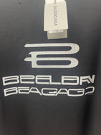 Balenciaga dark short-sleeve T-shirt with hanging tag and large chest graphic