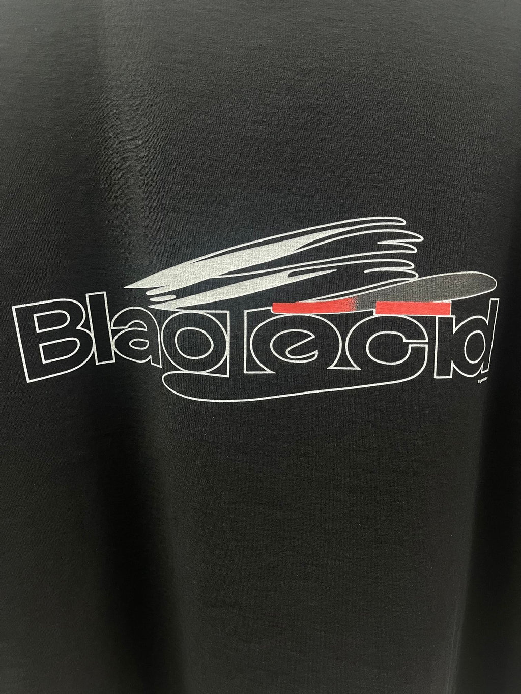 Balenciaga dark short-sleeve T-shirt with close-up chest graphic logo