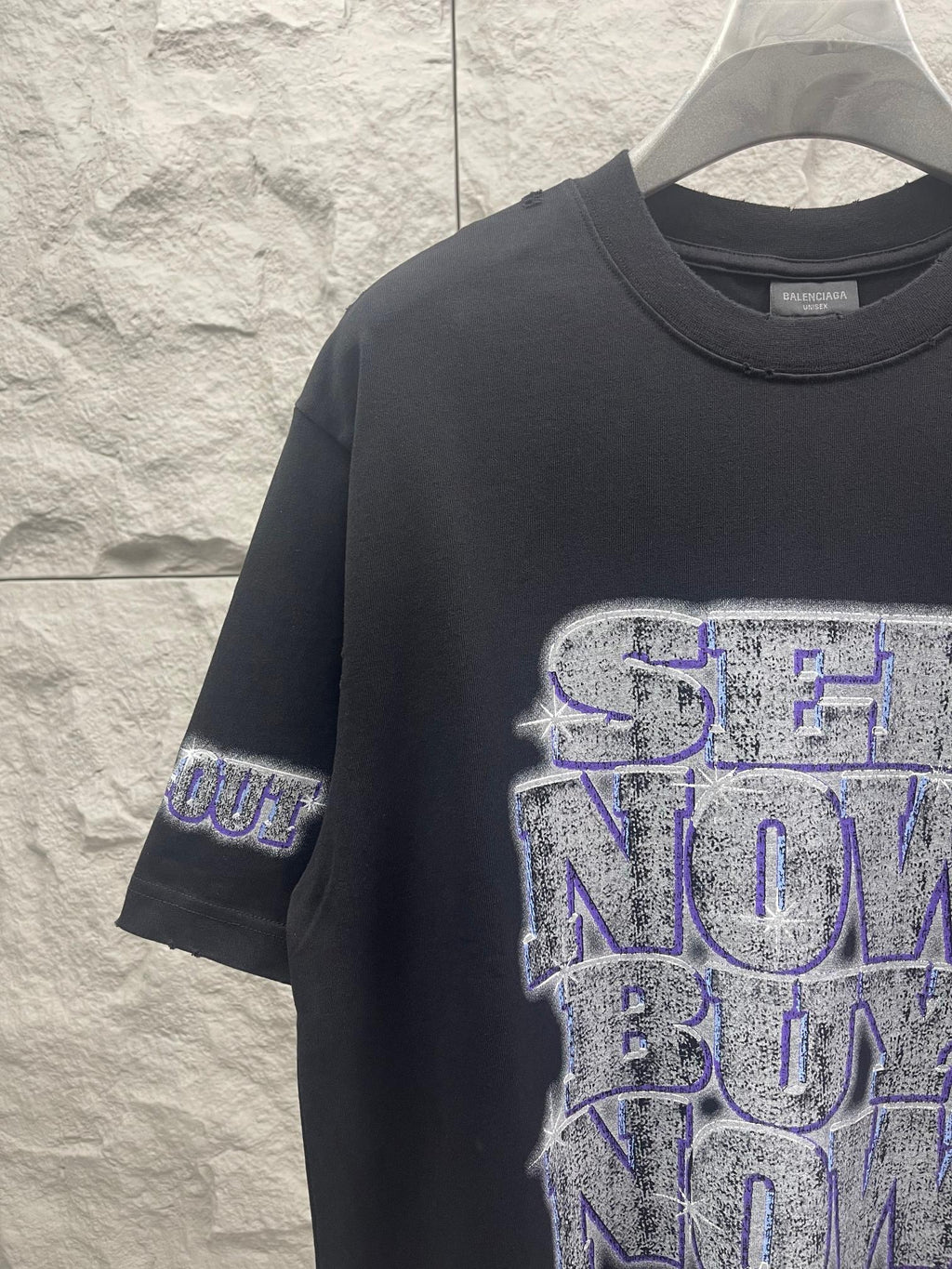 Balenciaga graphic T-shirt in dark color with large blue-toned logo print front