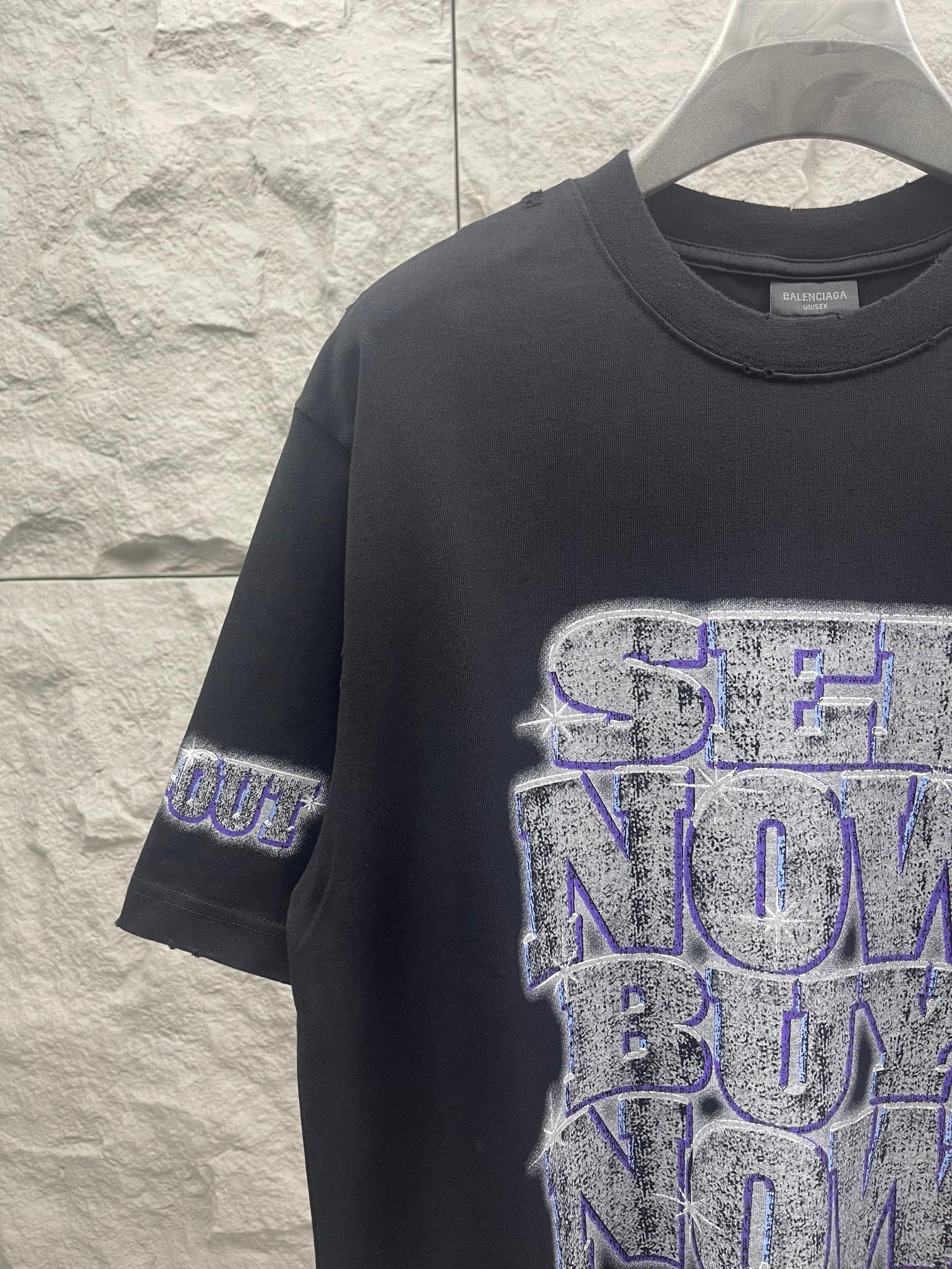 Balenciaga graphic T-shirt in dark color with large blue-toned logo print front