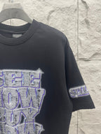 Balenciaga graphic T-shirt in dark color, sleeve cuff with small logo patch