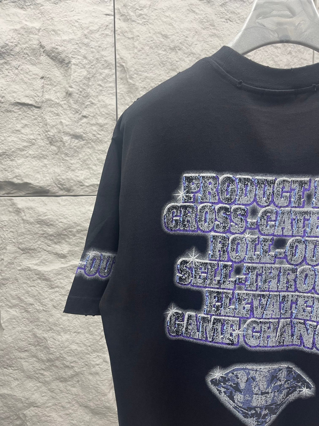 Balenciaga graphic T-shirt in dark color with blue glitter-style logo print and hourglass