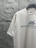 Balenciaga short-sleeve T-shirt, white, partial chest logo graphic.