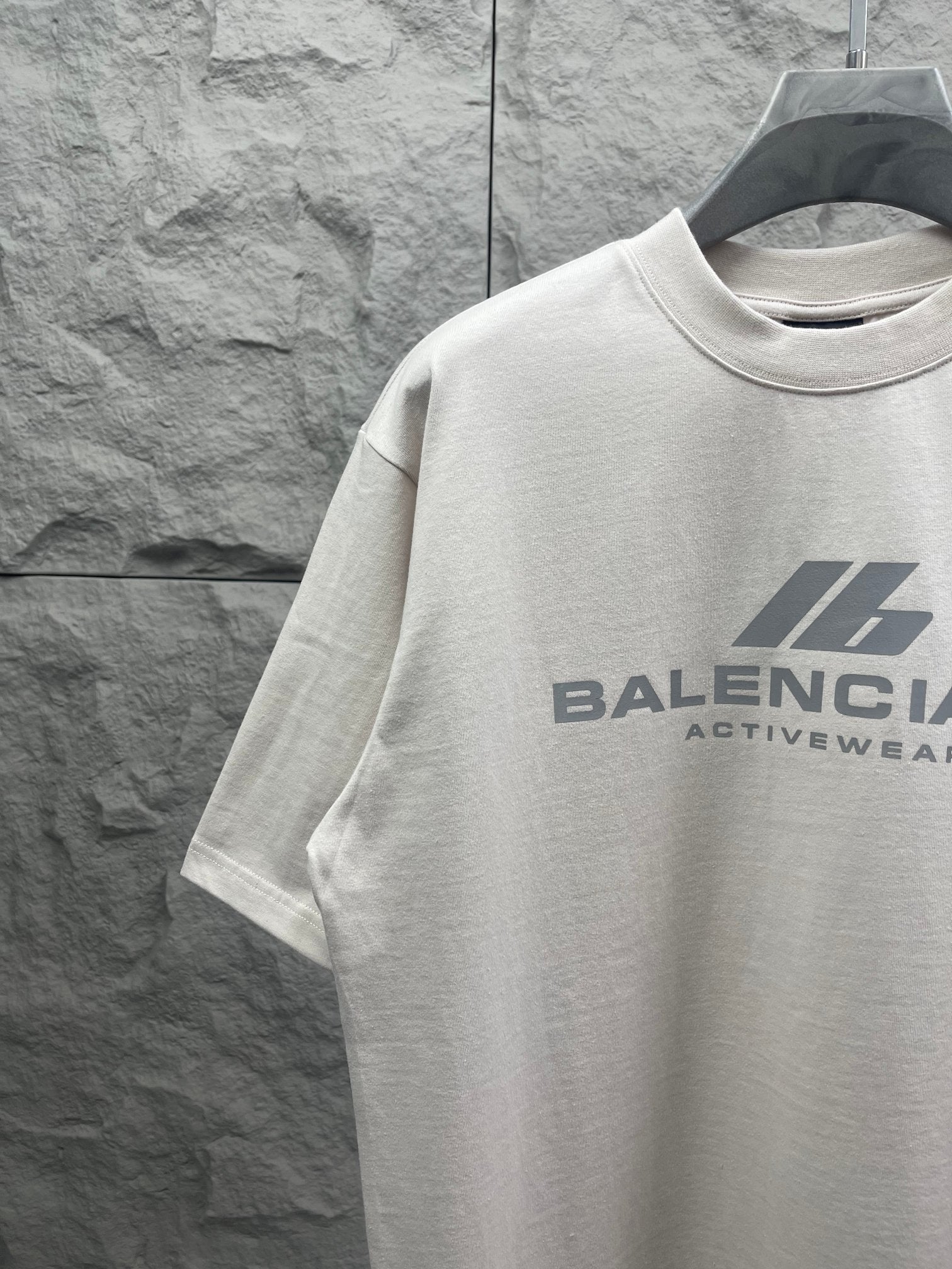 Balenciaga short-sleeve T-shirt, white, partial chest logo graphic.