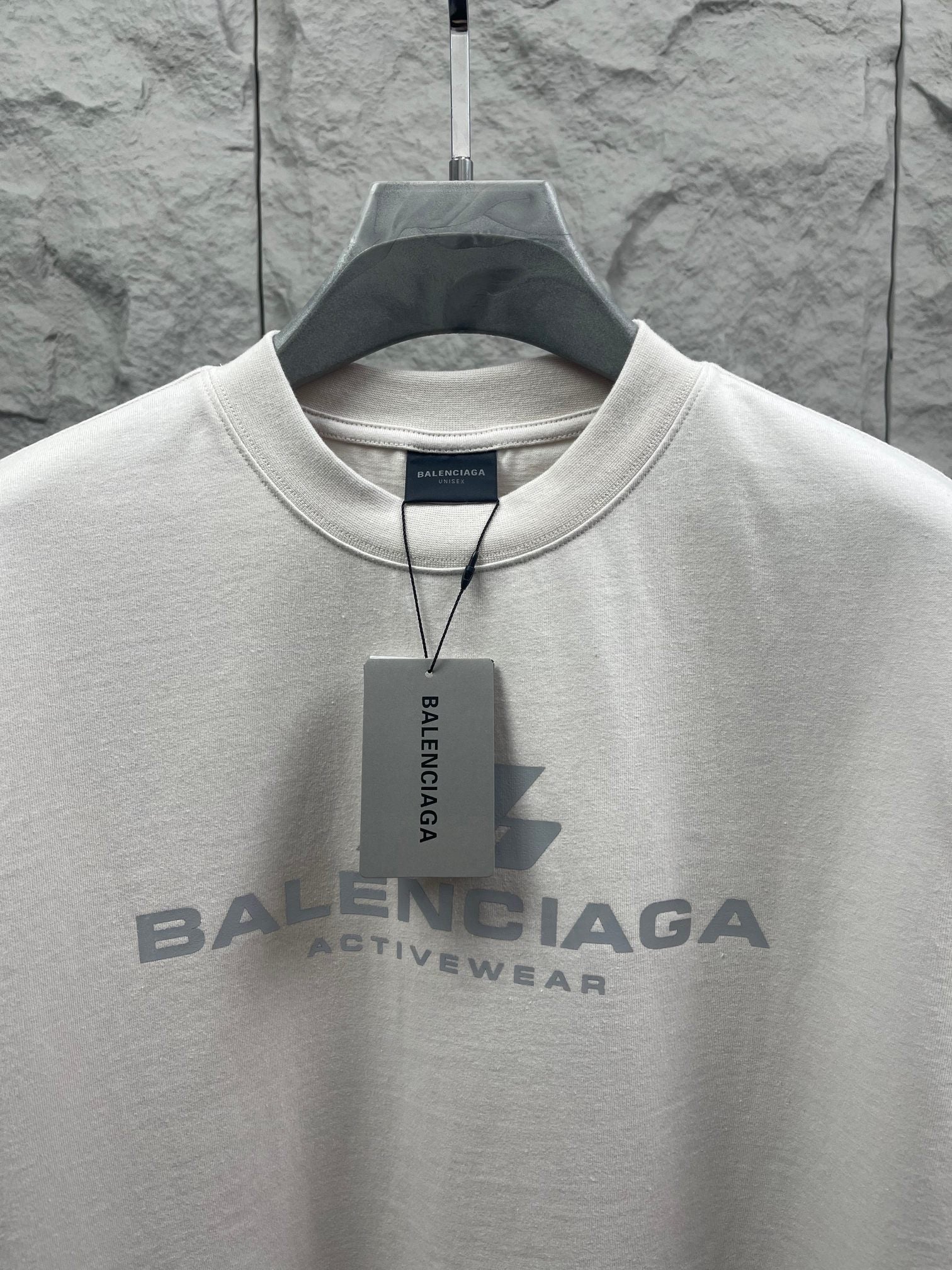 Balenciaga short-sleeve T-shirt, white, crew neck with logo and tag.
