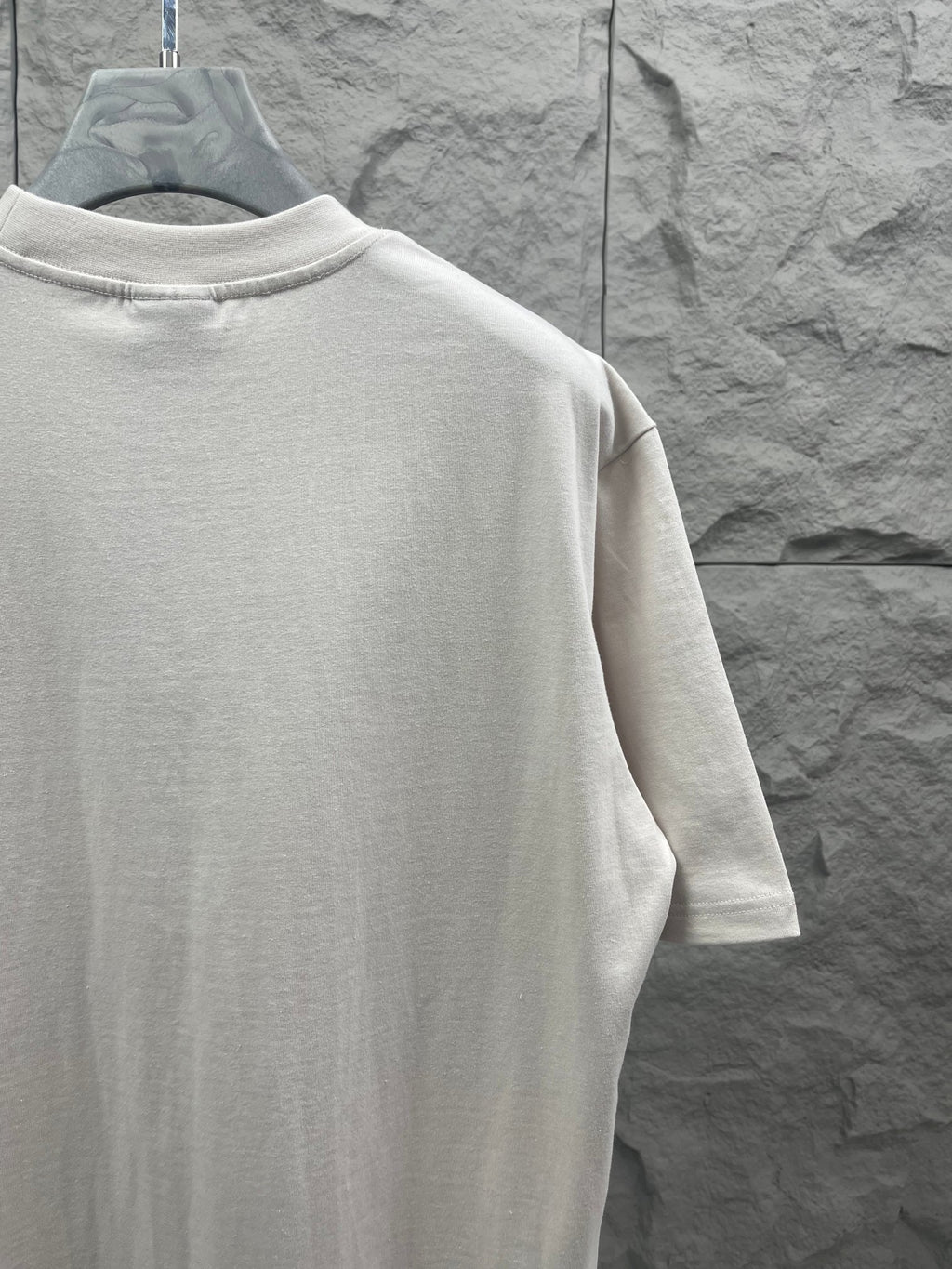 Balenciaga short-sleeve T-shirt, white, side/back view with plain back.