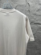 Balenciaga short-sleeve T-shirt, white, side/back view with plain back.