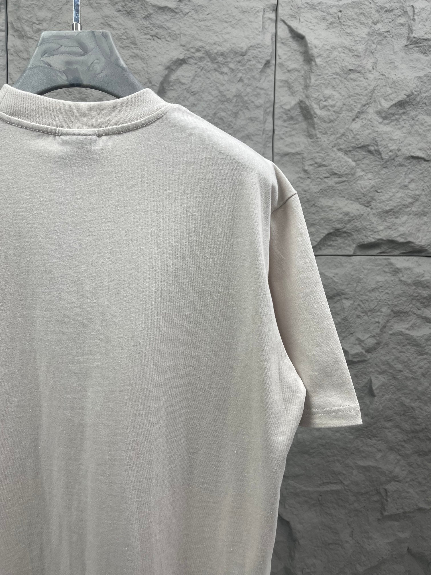 Balenciaga short-sleeve T-shirt, white, side/back view with plain back.
