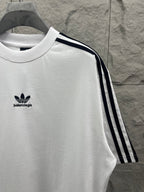 Balenciaga white short-sleeve T-shirt with black triple stripes on shoulder sleeve