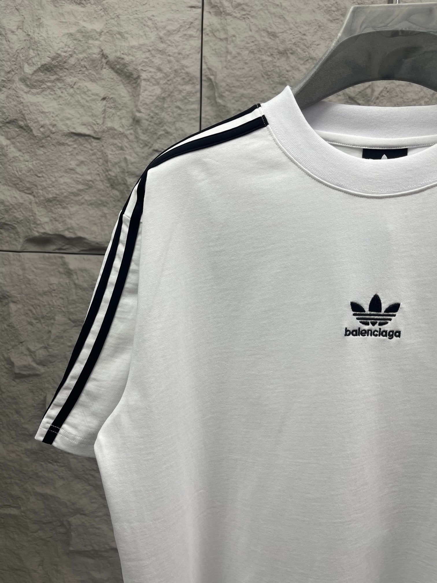 Balenciaga white short-sleeve T-shirt with small chest logo and black side stripe