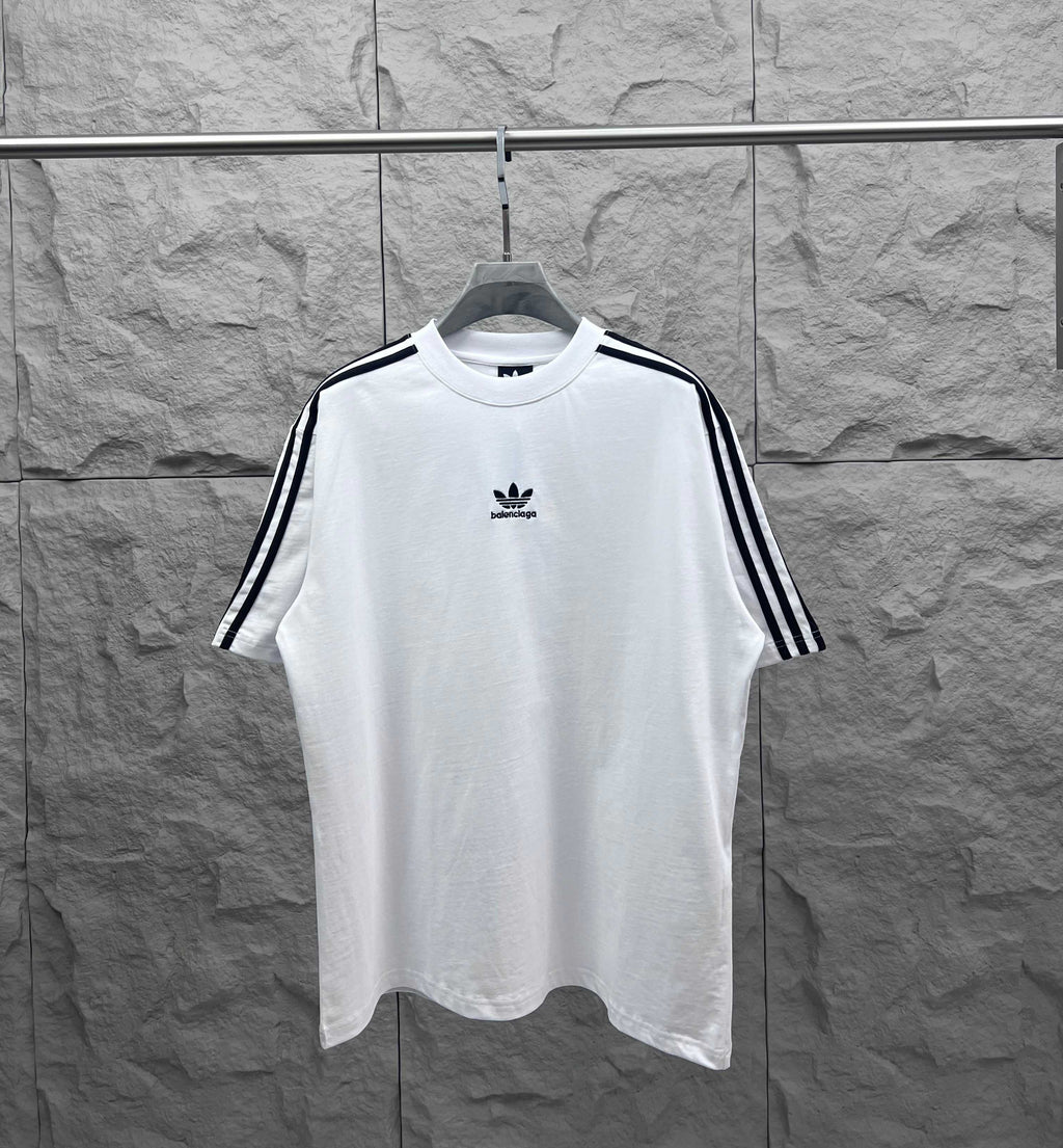 Balenciaga white short-sleeve T-shirt with black triple-stripe sleeves and chest logo