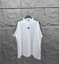 Balenciaga white short-sleeve T-shirt with black triple-stripe sleeves and chest logo