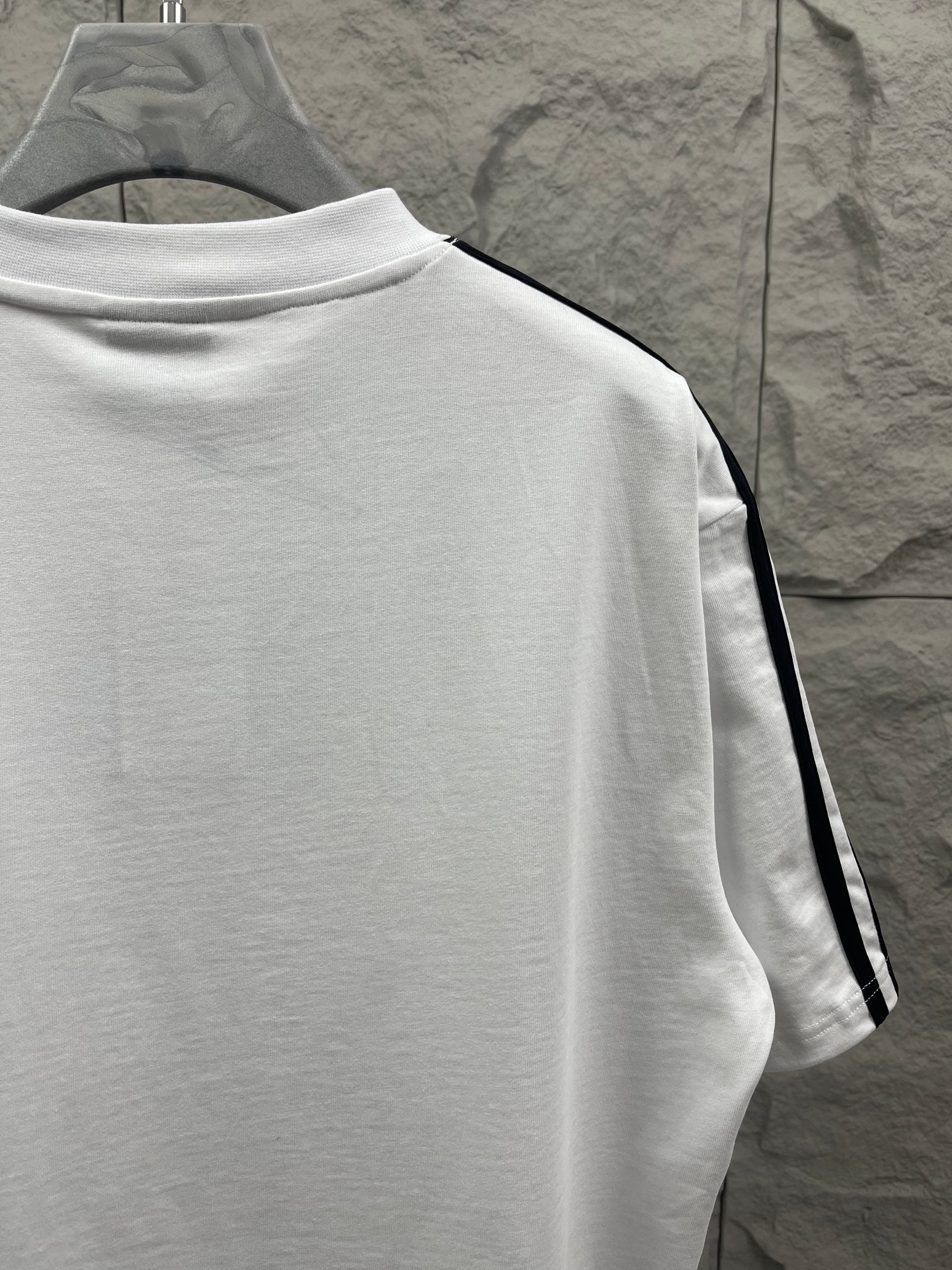 Balenciaga white short-sleeve T-shirt back with black triple stripe sleeve detail