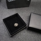 Silver-tone flower design ring in black gift box