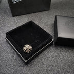 Silver-tone flower design ring in open black box